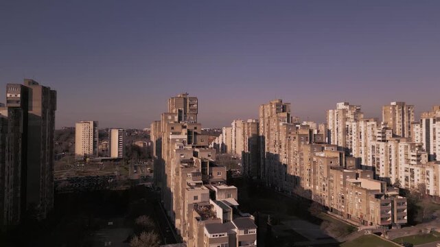Aerial drone footage of the iconic stepped residential buildings (Blok 45/63) in New Belgrade, showcasing unique brutalist architecture from the socialist modernism era. Belgrade,Serbia 02.02.2026

