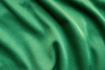 Green sports clothing fabric football shirt jersey texture close up