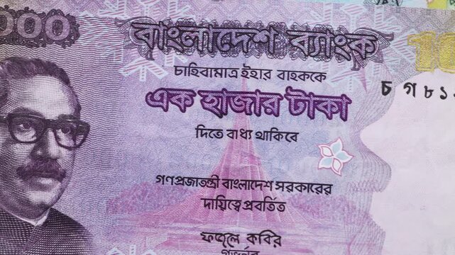 A macro closeup of a Bangladesh 1000 Taka bank note.