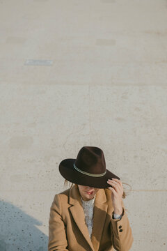 Young hipster woman with a hat