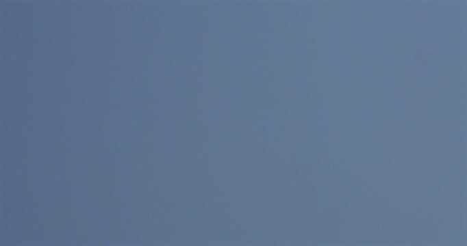 Wide panning shot left to right of the radar on the coastal monitoring system mast at the Trafalgar Point, stone jetty in Morecambe