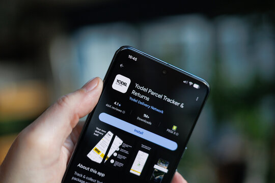 Yodel Parcel Tracker App on mobile phone in hand in a lifestyle setting