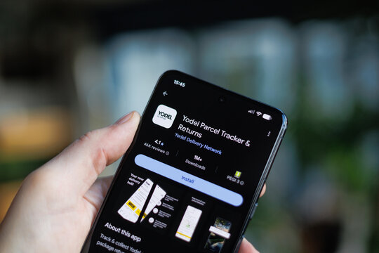 Yodel Parcel Tracker App on mobile phone in hand in a lifestyle setting