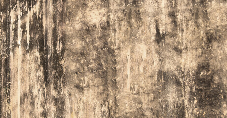 Fototapeta premium Abstract grunge wall texture with layered stains, erosion marks, and uneven tonal transitions.