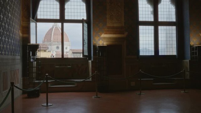 Interior museum gallery with soft defocused window view of a distant cathedral dome and ornate patterned walls, shallow focus; background backplate copyspace.