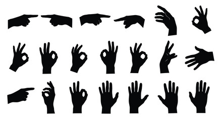 Collection of black silhouette human hand gestures including pointing and ok signs