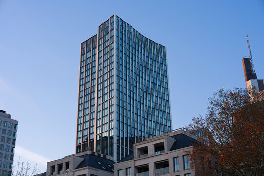 Looking up modern office tower named WINX Tower downtown of German city of Frankfurt on a winter sunset. Photo taken November 22nd, 2025, Frankfurt am Main, Germany.