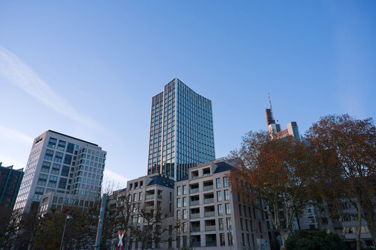 Looking up modern office tower named WINX Tower downtown of German city of Frankfurt on a winter sunset. Photo taken November 22nd, 2025, Frankfurt am Main, Germany.