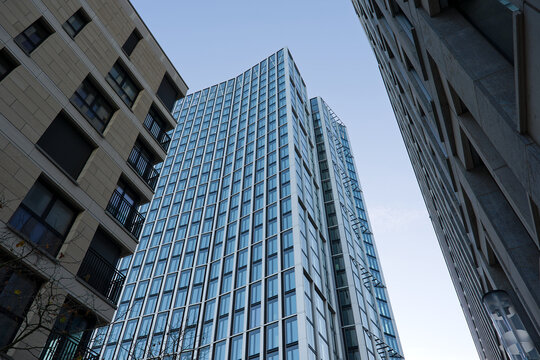 Looking up modern office tower named WINX Tower downtown of German city of Frankfurt on a winter sunset. Photo taken November 22nd, 2025, Frankfurt am Main, Germany.