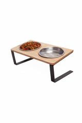 Cat and dog water and food bowls on a white background.