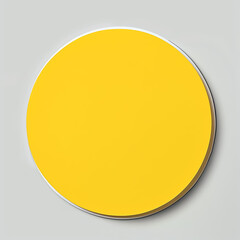 a yellow circular sticker with white paper
