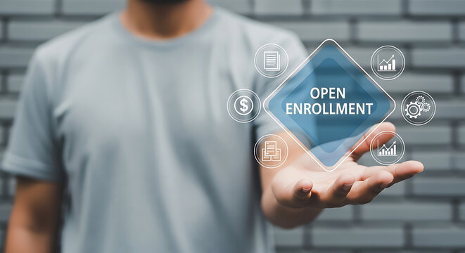 Man holding open enrollment concept on hand with icons