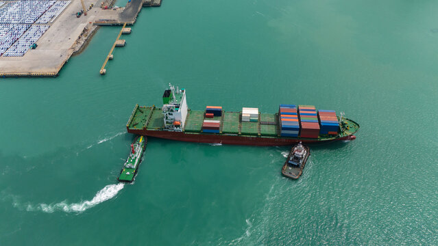 Aerial view from a container drone. Container ships in export-import and logistics business Transporting goods to large ports Worldwide shipping and logistics business International business abroad