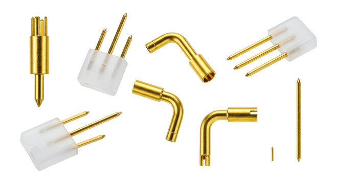 Gold-plated pogo pin connectors and angled contact pins with white plastic housings arranged on a transparent background