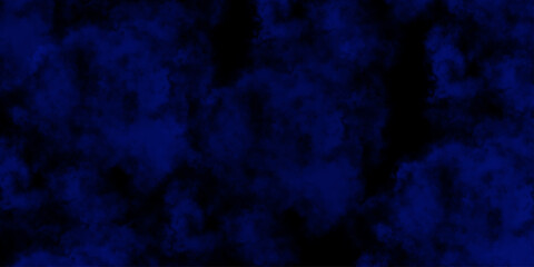 Artificial magic smoke in black and blue light on black background in darkness. light blue and dark blue background. Black and blue Grunge Concrete Wall Texture Background.