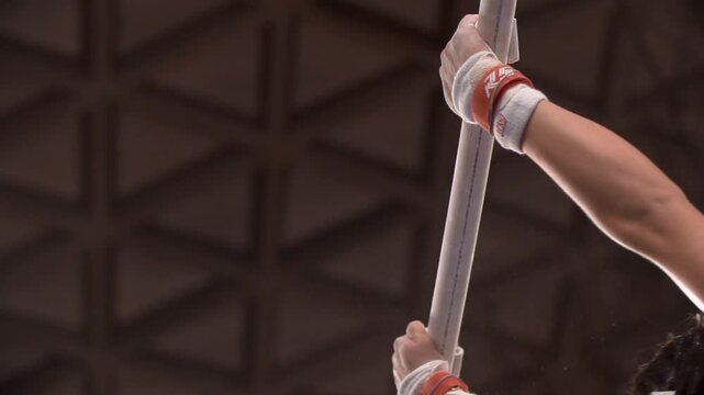 Gymnast on uneven bars