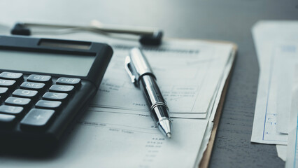 Calculator and documents on the table