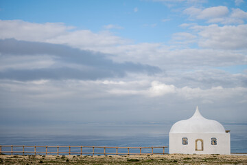 White chapel with wide sky at Cabo Espichel