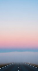 Empty road through fog at sunrise with pastel sky depth wallpaper 4k
