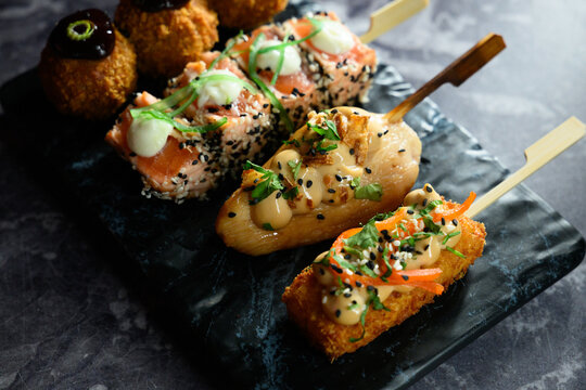 Gourmet Japanese fusion skewers with crispy fried toppings
