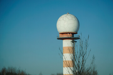 Communication tower with spherical radome