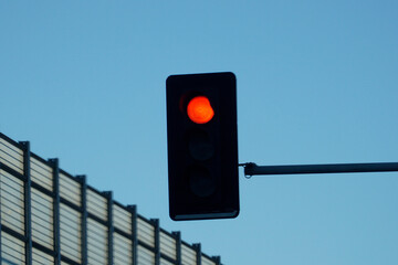 Red traffic signal on the roadside