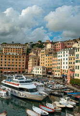 Fototapeta premium fishing town of Camogli, houses and boats in the port, Liguria, Italy