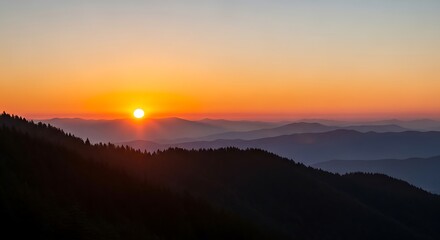 Breathtaking mountain sunset with layered hills and vibrant sky