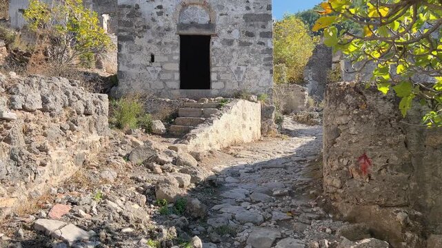 Ruined houses in the abandoned town of Kayakoy near Oludeniz, Fethiye, T&uuml;rkiye.