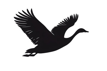 Obraz premium Soaring Silhouette: A majestic goose takes flight, its silhouette against the sky, symbolizing freedom and the beauty of avian grace.