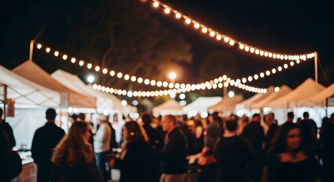 Crowded night market scene with blurred people silhouettes and glowing string lights hanging above