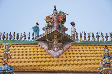 Roof of the ordination hall at Wat Pariwat Ratchasongkram incorporates contemporary art into its decoration , Bangkok city in Thailand.