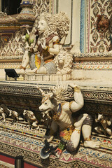 Contemporary stucco art decorative elements in the ordination hall of Wat Pariwat Ratchasongkhram incorporate concepts related to Buddhist beliefs, philosophy, and the past lives of the Buddha.Bangkok