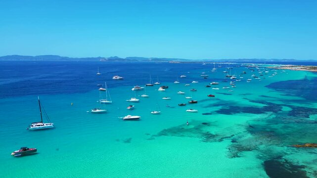 speed ramp island with many yachts and sailboats. Magic aerial view drone