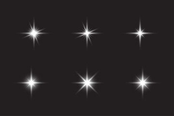 Realistic Shining Stars Set with Glow and Sparkle Effects.eps