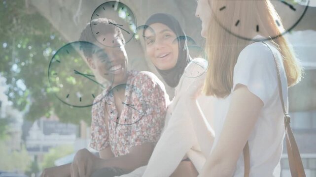 Three women sitting on park bench talking causing clocks floating over faces teaching time