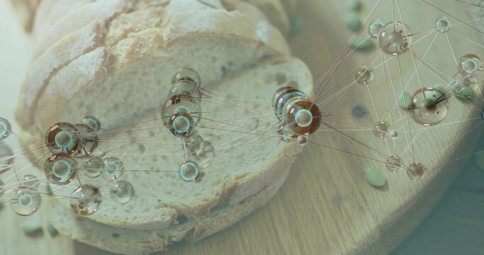 Displaying sliced artisanal loaf sitting on cutting board, with seeds and teal molecular graphic