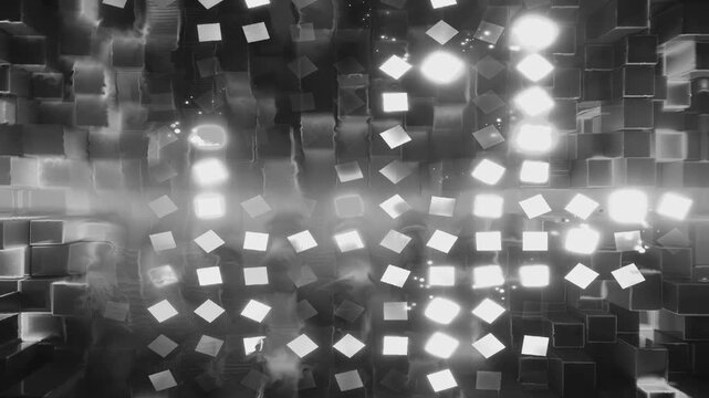 Animation of Black and White Abstract Shapes Floating in a Rhythmic Pattern With Smooth Transitions