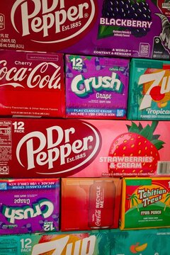 Niagara-on-the-Lake Canada - 18 December 2025 - Carton boxes of pop lemonade soft drinks piled on top of each other in a colourful display