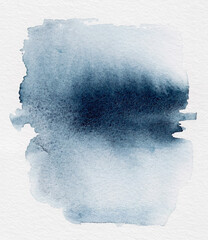 Abstract blue watercolor wash background. Dark indigo paint stain with rough edges on white paper.
