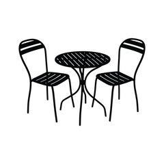 Black chairs and table with round top