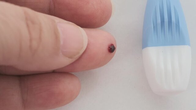 Finger prick for blood self-testing, Blood self-test procedure, showing finger prick step for personal health monitoring, convenience and accessibility at-home health diagnostics