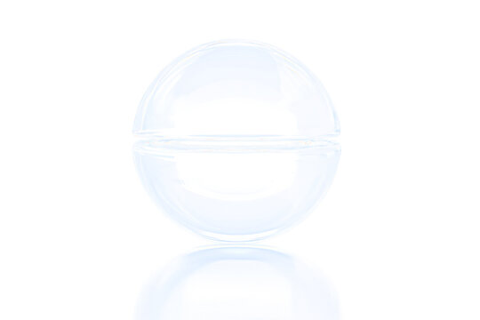 Open, empty, clear glass sphere with reflection