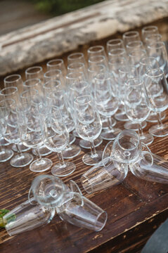 Perfect collocation of glasses of wine over an old wood table.