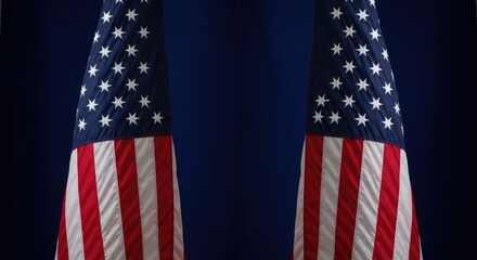 Fototapeta premium American flag draped on two poles