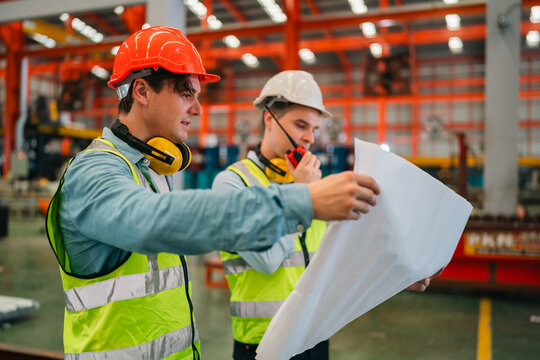 Railway transportation engineers working in industrial facility, public transport system innovation, electric train technology, professional teamwork and modern transit infrastructure