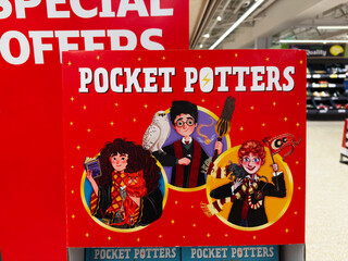 Obraz premium Pocket Potters display featuring wizard characters with broom owl and magical pets