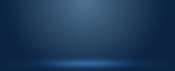 Moody dark blue studio background with soft spotlight