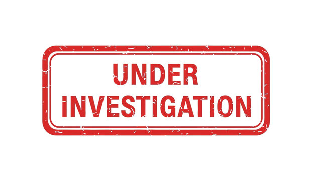 A red rubber stamp with the words under investigation