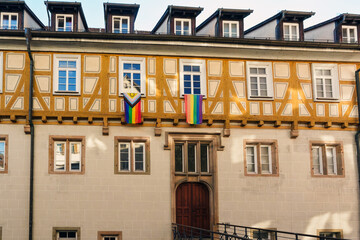 Historic Half-Timbered Building Alte Burse in Tubingen with LGBT Pride Flags